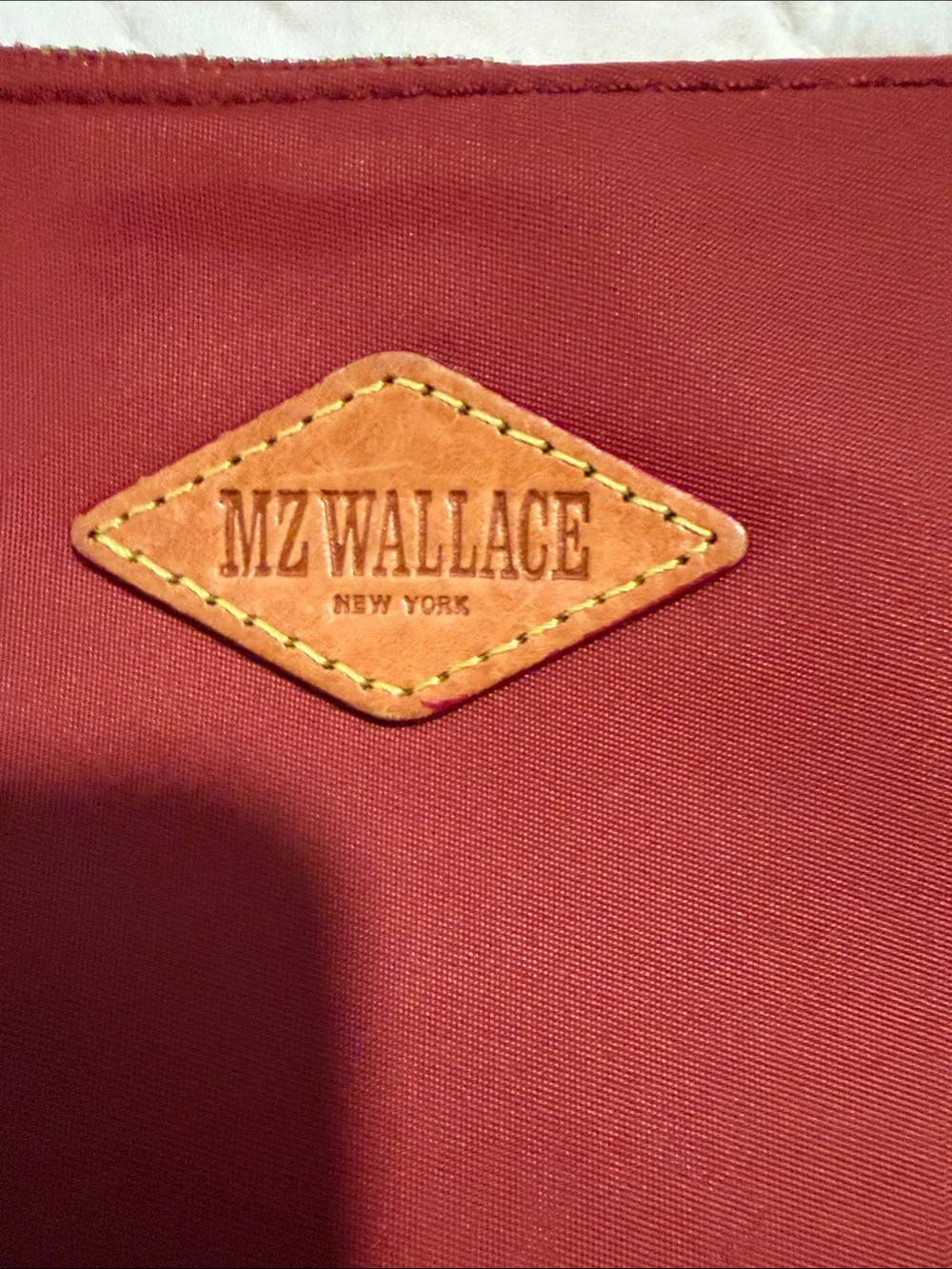 MZ Wallace Burgundy Zip Pouch with Tan Leather Logo